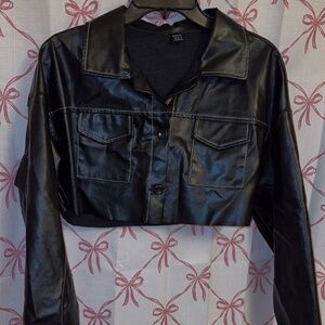Cropped leather jacket with white detail stitching